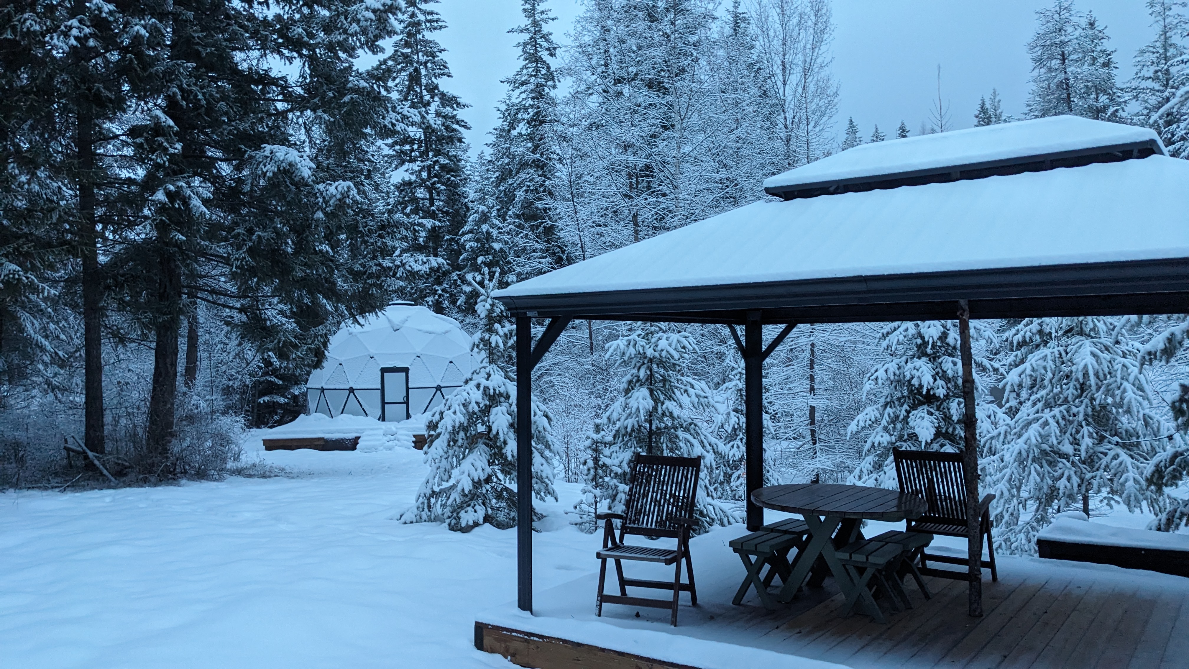 Gazebo and dome covered in snow